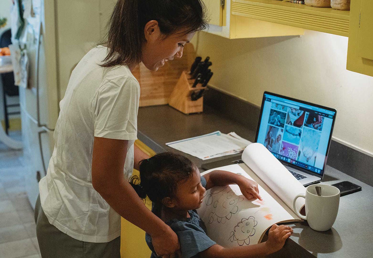 A young family spends time together in their home.