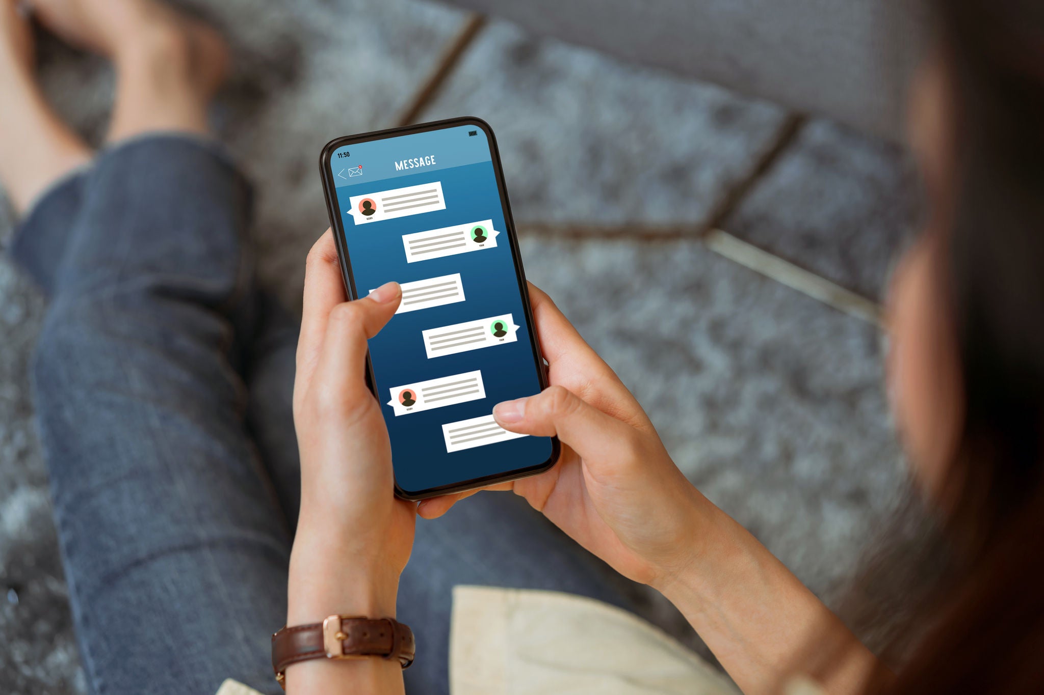 Young woman sitting on carpet and hand holding smartphone and show screen new chat messages notification. Concept social network.