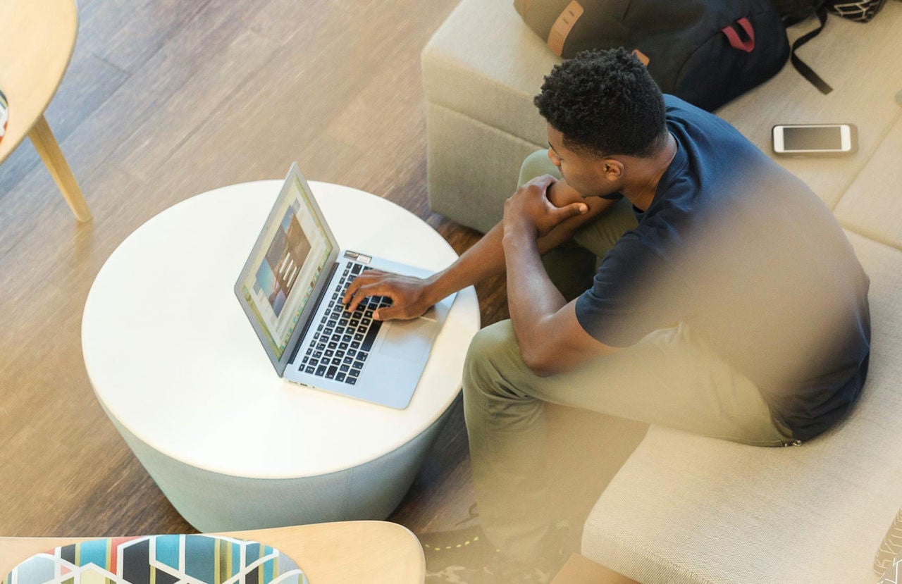 man working at computer