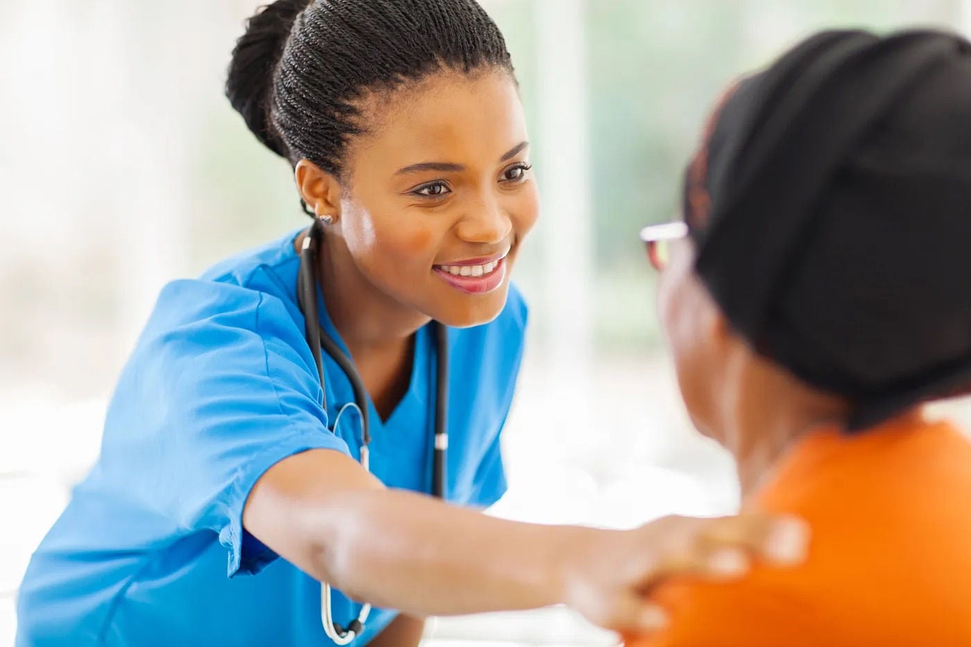 nurse comforting patient