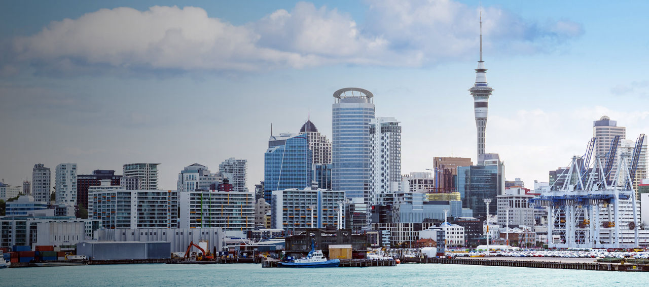 The Auckland skyline as seen on a pleasant day from the harbor. 